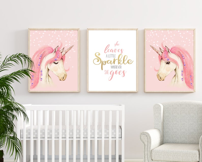 May include: Three pink and white unicorn nursery prints with gold glitter accents. The centre print features the text "She leaves a little sparkle wherever she goes".