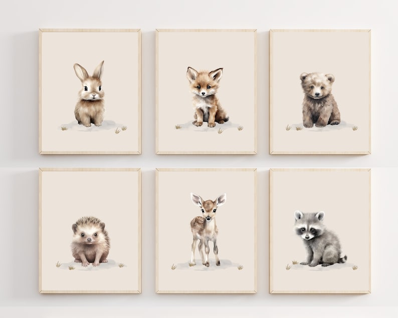 May include: Set of six watercolor illustrations of baby animals, including a rabbit, fox, bear, hedgehog, deer, and raccoon. Each animal is depicted in a cute and whimsical style, with soft brown, gray, and white tones.