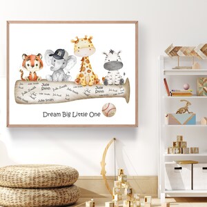 May include: A watercolor print featuring a baseball bat with a tiger, elephant, giraffe, and zebra sitting on top. The bat is surrounded by signatures and the text "Dream Big Little One".