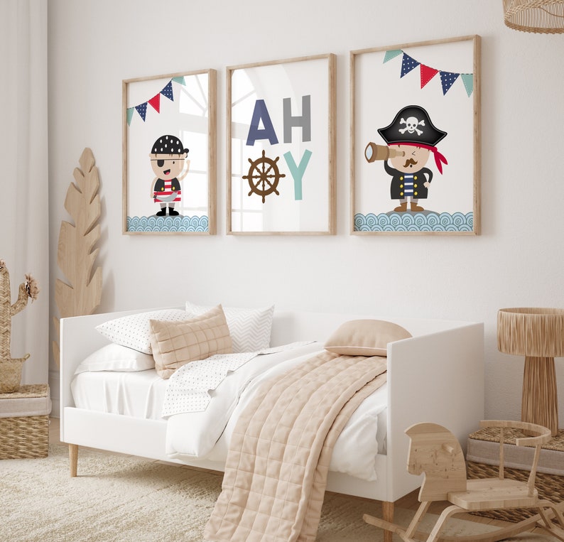 Boys Pirate room set of 3 prints.  One print with a Pirate Captain looking through a telescope and one print with a Pirate waving. Another print with "Ahoy" text.