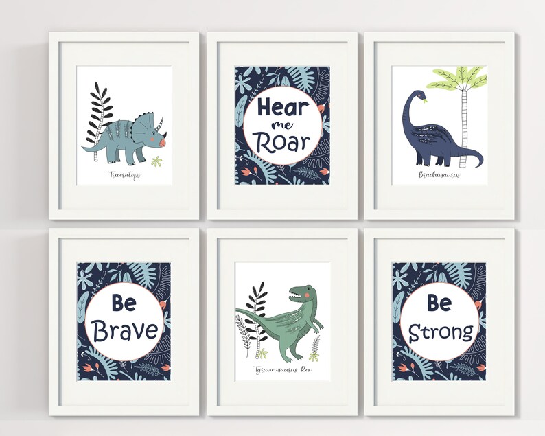 May include: Set of six blue and green dinosaur themed prints with motivational quotes. The prints feature illustrations of dinosaurs, including a Triceratops, Brachiosaurus, and Tyrannosaurus Rex. The quotes include "Hear me Roar", "Be Brave", and "Be Strong".