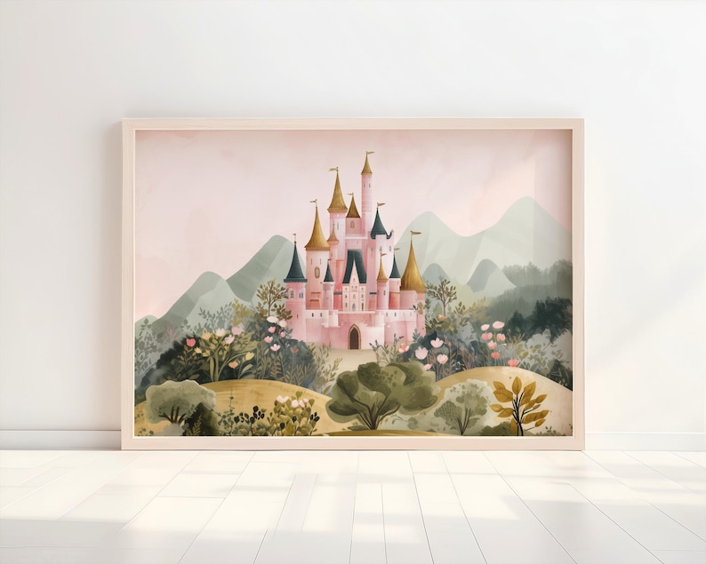May include: A framed watercolor print of a pink castle with gold and blue turrets, set against a backdrop of green mountains and lush foliage. The artwork is in a light wood frame, creating a whimsical and fairytale-like scene.