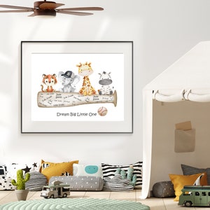 May include: A watercolor illustration of a tiger, elephant, giraffe, and zebra sitting on a baseball bat. The bat is signed with the name "Julie Smith" and the text "Dream Big Little One".