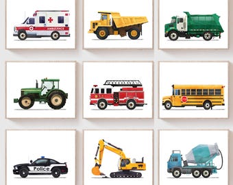 May include: Nine framed prints featuring various vehicles. The collection includes an ambulance, dump truck, garbage truck, tractor, fire truck, school bus, police car, excavator, and cement mixer. Each print showcases a detailed illustration of the vehicle.