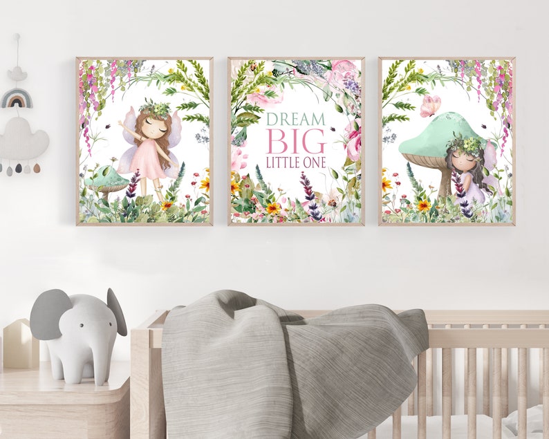 May include: Three watercolor prints featuring a fairy with wings, a mushroom with a fairy, and a floral wreath with the text "Dream Big Little One".