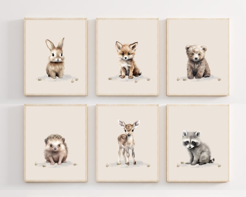 May include: Set of six watercolor illustrations of baby animals, including a rabbit, fox, bear, hedgehog, deer, and raccoon. Each animal is depicted in a cute and whimsical style, with soft brown, gray, and white tones.