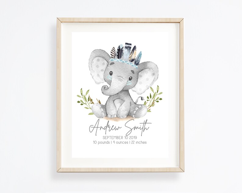 May include: A watercolor illustration of a gray elephant wearing a blue and brown feather headdress. The elephant is sitting on a white background with green leaves. The text "Andrew Smith, September 10, 2019, 10 pounds 14 ounces | 22 inches" is below the elephant.