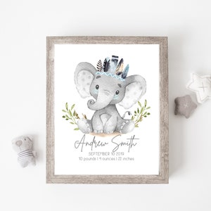 May include: A watercolor illustration of a gray elephant wearing a blue and black feather headdress. The elephant is sitting on a brown surface with green leaves. The text "Andrew Smith, September 10, 2019, 10 pounds 14 ounces 22 inches" is below the elephant.