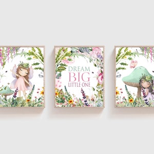 May include: Three watercolor prints featuring a fairy in a pink dress and wings, surrounded by flowers and greenery. The middle print has the text "Dream Big Little One".