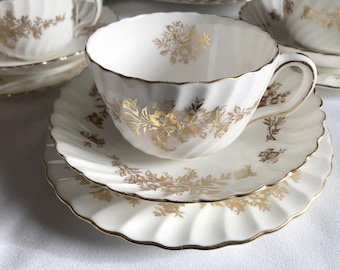 Minton Marlow goudpatroon, Bone China Trio, kop, schotel en zijbord