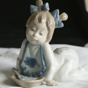 Nao by Lladro  Figurine, Baby Girl with her Bowl of Porridge, made in Spain, collectible