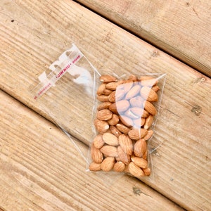 50 genomskinliga självhäftande påsar - livsmedelssäkra plastpåsar - genomskinliga godispåsar (3 storlekar) bild 3