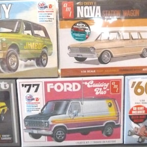 May include: Collection of vintage model car kits, including a GMC Jimmy, Chevy II Nova Station Wagon, '69 Yenko Chevy Camaro, '77 Ford Cruising Van, and a '60 Chevrolet pickup truck. Each box features detailed car illustrations.