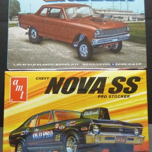 May include: Two model kit boxes featuring classic Chevrolet cars. The top box displays a red 1965 Chevrolet Chevy II Gasser. The bottom box showcases a black and yellow Chevy Nova SS Pro Stocker model. Both are 1/25 scale plastic model kits.
