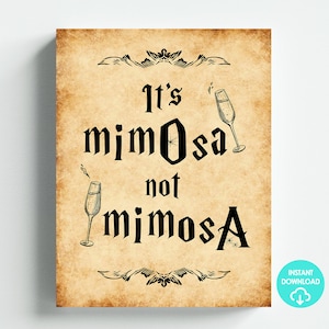 May include: A vintage-style printable sign with a brown background and black text that reads "It's mimosa not mimosa". Two black and white illustrations of champagne flutes are on either side of the text.