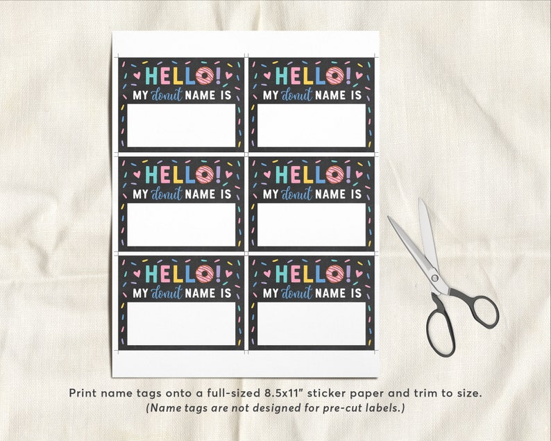May include: Six printable name tags with a donut and sprinkles design. The tags say "HELLO! MY donut NAME IS" and have a blank space for a name. The tags are designed to be printed on 8.5x11 inch sticker paper and trimmed to size.