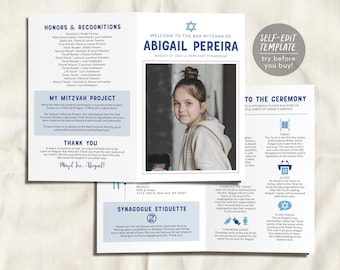 May include: A folded Bar Mitzvah program for Abigail Pereira featuring a central photograph of a child, blue text headers, and sections titled Honors & Recognitions, My Mitzvah Project, Thank You, and To The Ceremony with a circular self-edit badge.