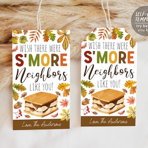Może przedstawiać: Dwie prostokątne etykiety na prezent z grafiką s'mores i napisem "Wish There Were S'More Neighbors Like You!". Etykiety przedstawiają jesienne liście i brązową obwódkę. Tekst "Love The Andersons" znajduje się na dole.