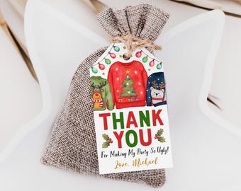 May include: A burlap drawstring gift bag with a white rectangular tag attached by twine. The tag features illustrations of three sweaters, colorful string lights, and the text: THANK YOU For Making My Party So Ugly! Love. Michael.