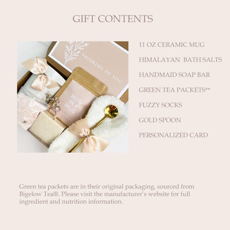 May include: A gift box with a ceramic mug, Himalayan bath salts, a handmade soap bar, green tea packets, fuzzy socks, a gold spoon, and a personalized card. The box is tied with a beige ribbon and includes the text "Thinking of You."