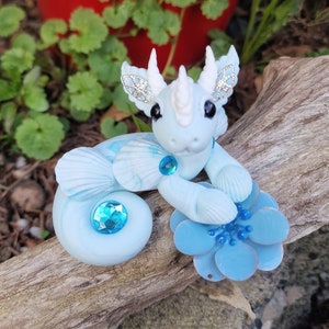 One of a kind, hand-crafted spirit figurine of a sea dragon called "Forget-me-not" blessed with rose oil