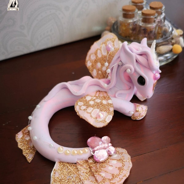 One of a kind, hand-crafted spirit figurine of a kelpie called "Ocean Wings" blessed with rose oil