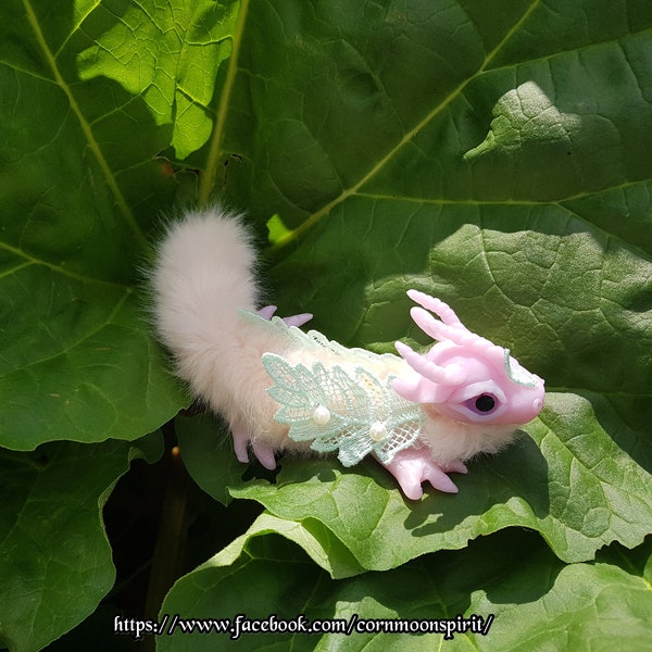 Hand-crafted spirit doll of a baby dragon called "Dusky Pink" blessed with jasmine oil