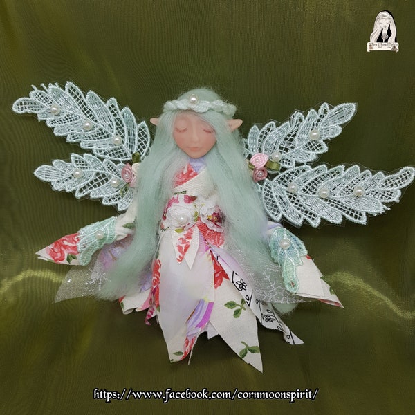 Hand-crafted spirit doll of a patchwork fairy girl called "Rachel" blessed with lilac oil
