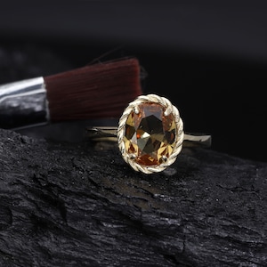 14k Solid Gold Oval Cut Diaspore Ring, Twisted Color Changing Diaspore Ring, Engagement Ring, Proposal Ring