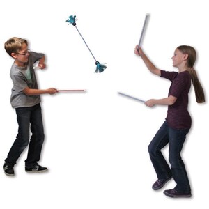 May include: Two people are playing with blue and white juggling sticks. The person on the left is holding a red stick and the person on the right is holding a blue stick.
