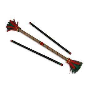 May include: A set of three juggling clubs with red, green, and brown accents. The clubs are made of wood and have a rope wrapped around the handle.