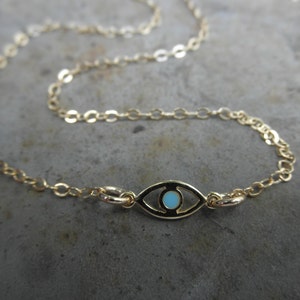 Gold evil eye bracelet with a touch of enamel 14K gold filled chain protection bracelet tiny evil eye bracelet image 2