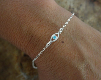 Evil eye bracelet with a touch of enamel sterling silver