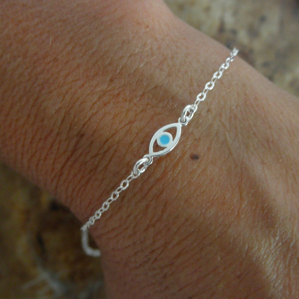 Evil eye bracelet with a touch of enamel sterling silver