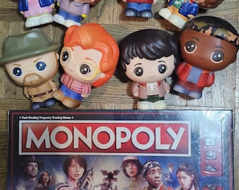 Stranger Things™ Collectibles Lot: Monopoly Board Game & 8 Soft’n Slo Squishies