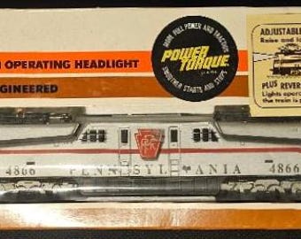Tyco Locomotive with Operating Headlight Pennsylvania 4866 Silver Shell