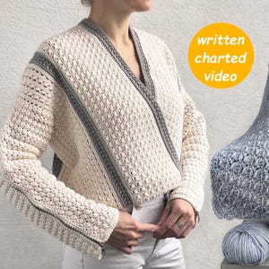 May include: Cream-colored crochet cardigan with gray trim, paired with a matching gray and cream crochet blanket. A blue crochet blanket and a ball of yarn are also visible. The image includes the text "written charted video".