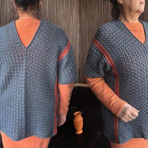 May include: A blue, short-sleeved, V-neck sweater with orange trim on the sleeves and sides. The sweater is worn over an orange long-sleeved shirt. The sweater has a textured, open weave design.