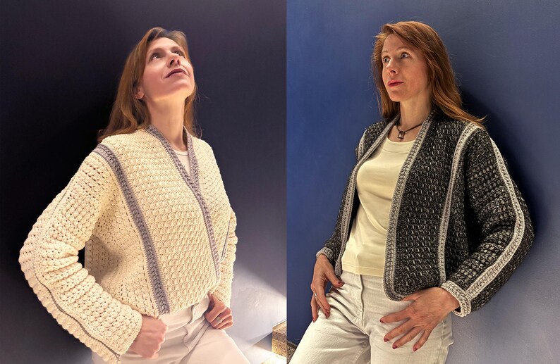 May include: Two crochet jackets are displayed. One is cream-colored with gray trim, the other is black with silver trim. Both jackets have a textured pattern and are open-fronted. The jackets are worn over a white top and paired with white pants.