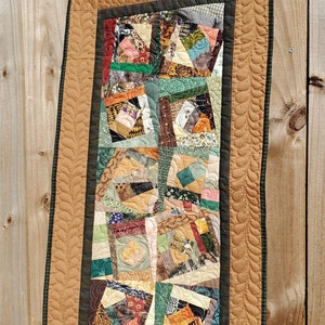 Earth Horns Quilted Table Runner NCU0NTD1737