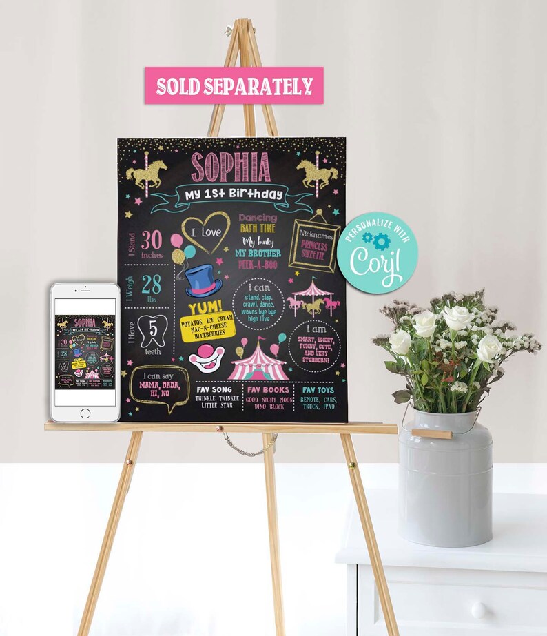 May include: A black chalkboard sign with gold glitter accents, featuring a circus theme. It says "Sophia My 1st Birthday" and lists details about the child, including age, height, weight, favorite foods, songs, books, and toys. The sign is personalized with the name "Corjl".