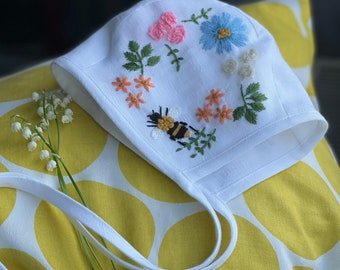Linen baby bonnet with botanical embroidery . 100 % washed linen; embroidered bonnet; embroidered baby bonnet.
