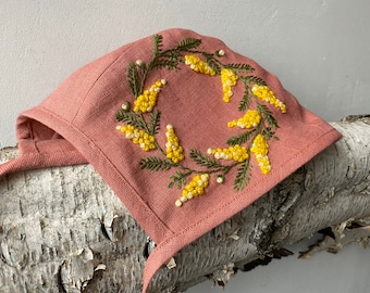 Linen baby bonnet with embroidered Mimosa flowers. embroidered bonnet; embroidered baby bonnet; yellow flower.