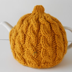 Tea cozy for teapot. Knitted tea cosy. Tea pot cozy. Handmade Irish aran teacozy. Handknit teapot cover.  Cable knit cosies from Ireland