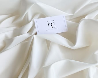 Tejido elástico de forro blanco roto cortado a medida, tejido elástico de color marfil claro para bodas, forro de tela para faldas y vestidos, MT6001