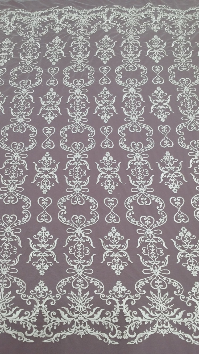 Ivory Embroidered Lace Fosette