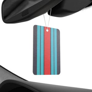 Op Martini Racing geïnspireerde geurende autoluchtverfrisser voor Porsche/Le Mans-fans: dennen, nieuwe auto's en Black Ice-geur afbeelding 1