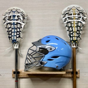 Lacrosse Helmet/2-stick Display - side view