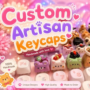 May include: A collection of custom artisan keycaps featuring miniature sculpted animal faces and food items, arranged on a light pink mechanical keyboard. The keycaps display various colors and designs, including cats and bears with toppings.