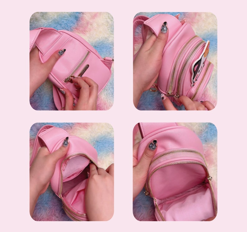 K&ouml;nnte beinhalten: Eine rosa Kunstleder-Umh&auml;ngetasche mit Rei&szlig;verschluss und einem kleinen Comic-Charakter-Aufn&auml;her. Die Tasche wird in verschiedenen Winkeln ge&ouml;ffnet und geschlossen gezeigt.